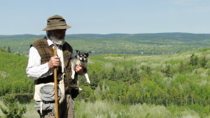 Howard Clifford with Pepi the chihuahua on Blueberry Mountain